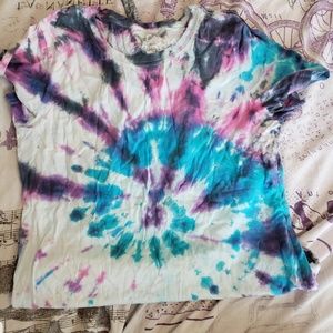 A purple/blue tie-dye top